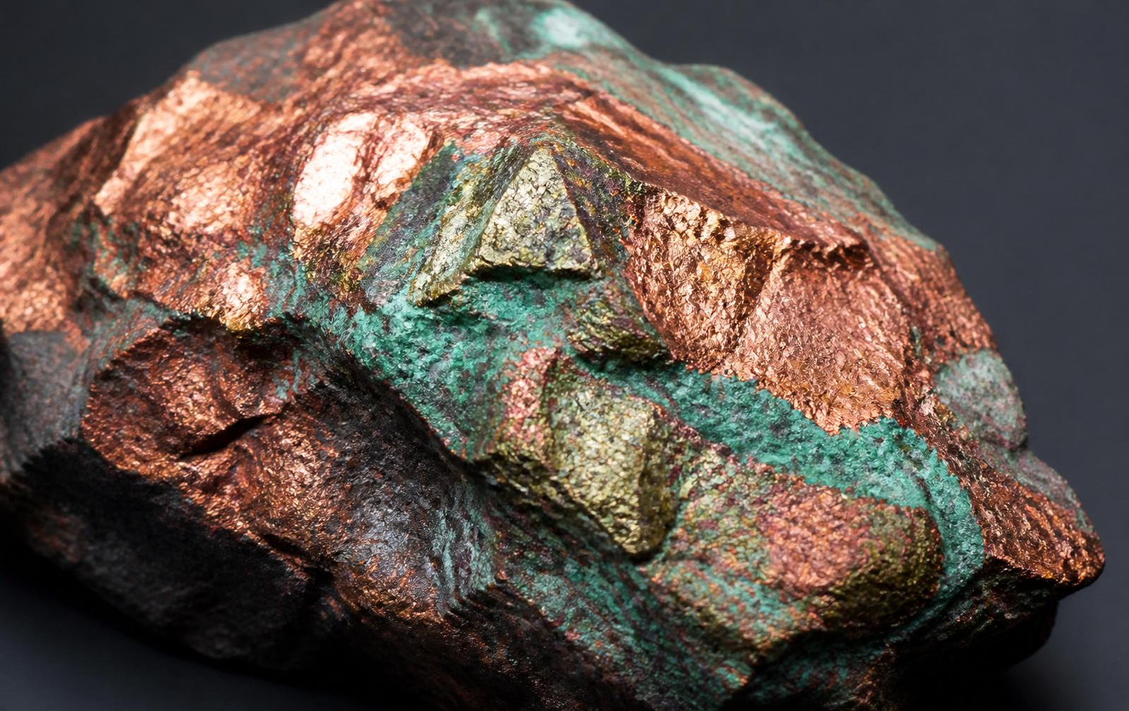 Raw copper ore with malachite and chalcopyrite mineralisation